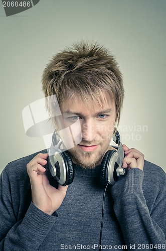 Image of Young man with headphones