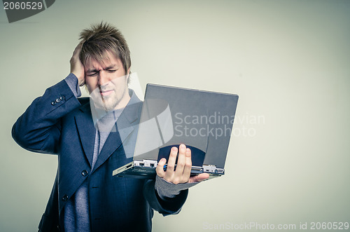 Image of Young man in business suit