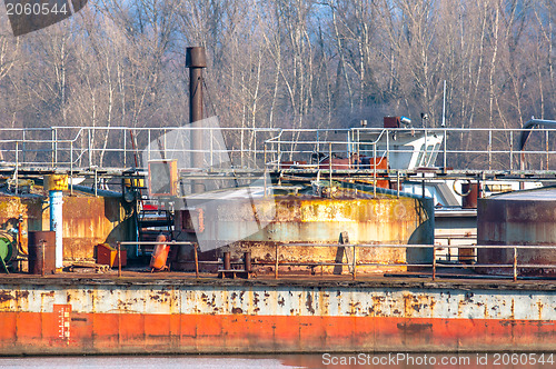 Image of Part of an industrial plant at the shores of a river