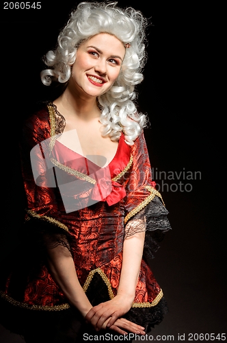 Image of Young woman in baroque costume