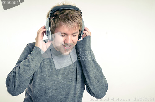 Image of Young man with headphones