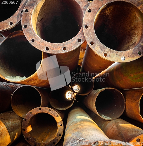 Image of Rusty old pipes stacked up