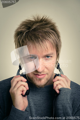 Image of Young man with headphones