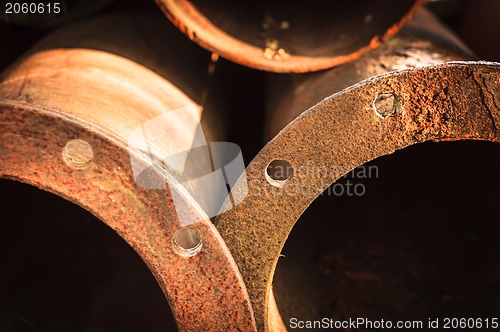 Image of Rusty old pipes stacked up