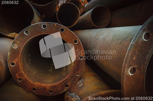 Image of Rusty old pipes stacked up