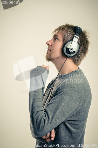 Image of Young man with headphones