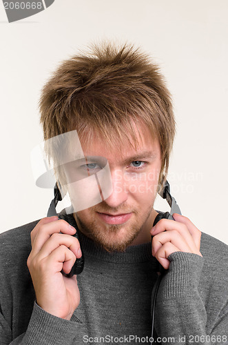 Image of Young man with headphones