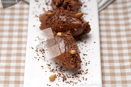 Image of chocolate mousse quenelle dessert
