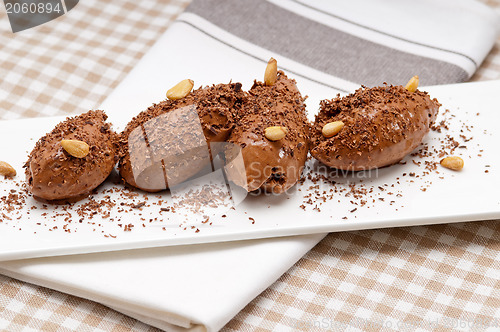 Image of chocolate mousse quenelle dessert