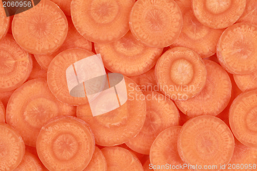 Image of Sliced carrots forming a background