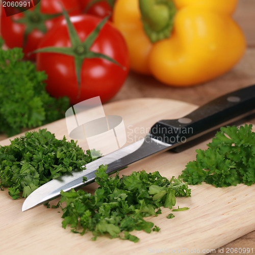 Image of Preparing food: Chopping parsley