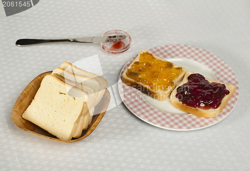 Image of Spread jam on bread