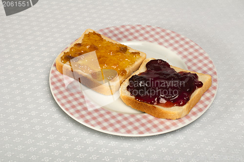 Image of Spread jam on bread