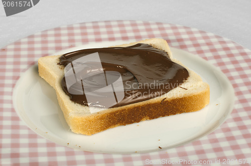 Image of Liquid chocolate on a slice of bread