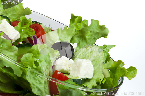 Image of Salad in a glass bowl close up
