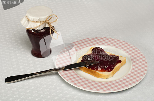 Image of Spread jam on bread