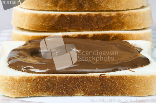 Image of Liquid chocolate on a slice of bread