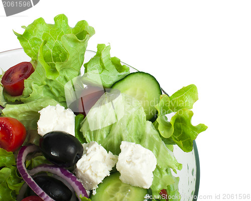 Image of Salad in a glass bowl close up