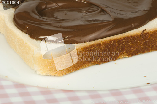 Image of Liquid chocolate on a slice of bread