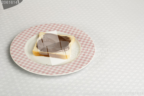 Image of Liquid chocolate on a slice of bread