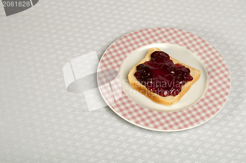 Image of Spread jam on bread