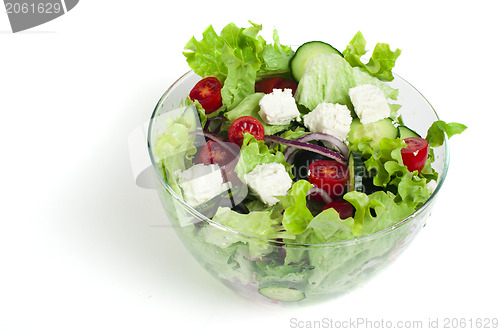Image of Salad in a glass bowl on a white background
