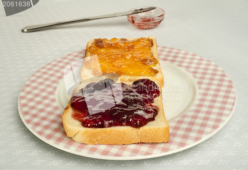 Image of Spread jam on bread