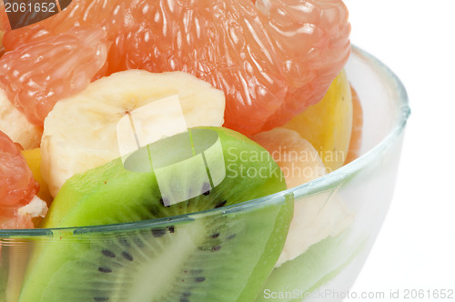 Image of Fruit salad with citrus in a glass bowl