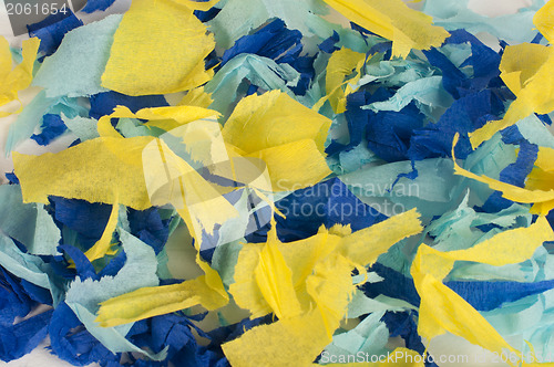 Image of Many colorful pieces of torn paper