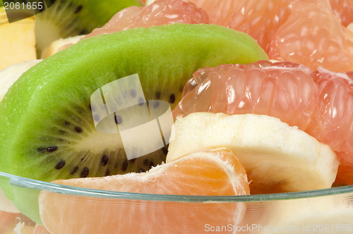 Image of Fruit salad with citrus in a glass bowl