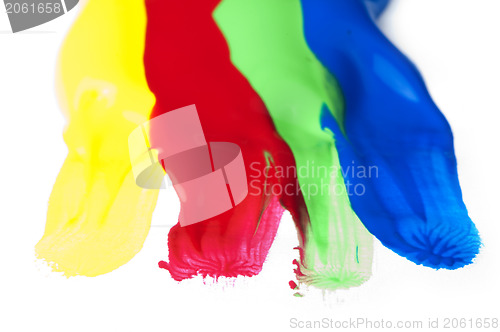 Image of Paint coated on paper. Red, green, blue and yellow colors.