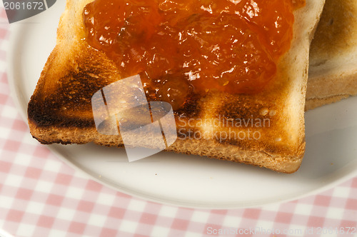 Image of Spread jam on bread