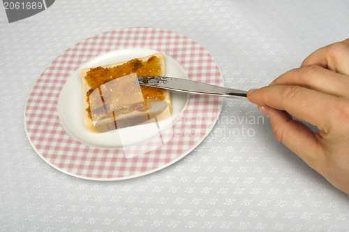 Image of Spread jam on bread