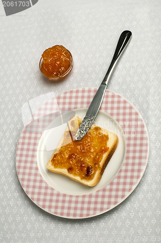 Image of Spread jam on bread