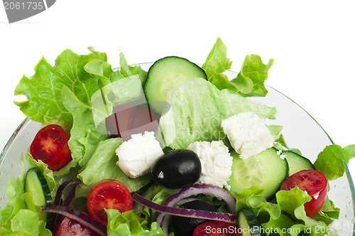 Image of Salad in a glass bowl close up