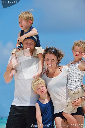 Image of happy family on vacation