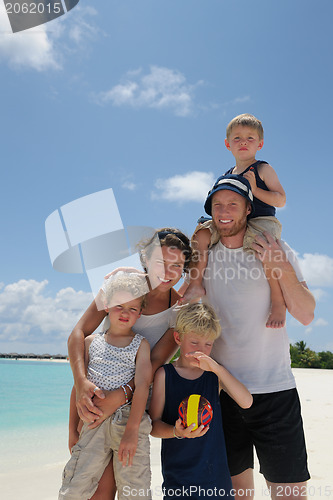 Image of happy family on vacation