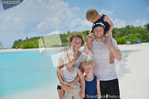 Image of happy family on vacation