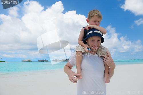 Image of happy family on vacation