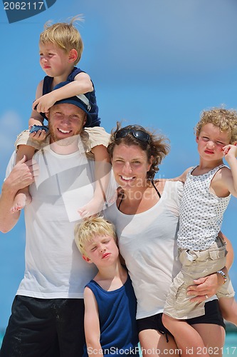 Image of happy family on vacation