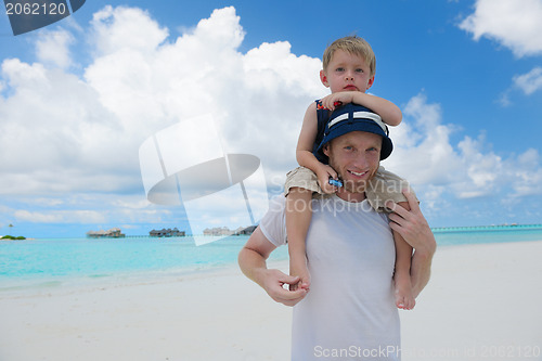 Image of happy family on vacation