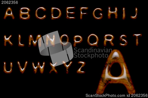 Image of Glossy wood alphabet