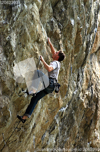 Image of Free climbing action