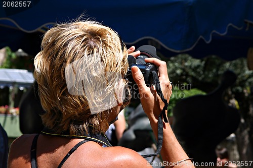 Image of Blond photographer woman