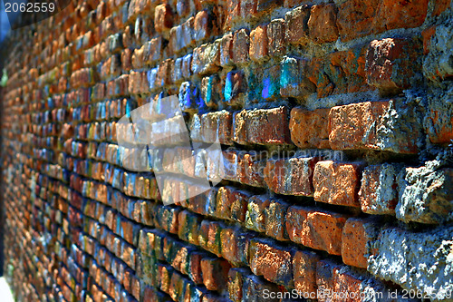 Image of Rugged red brick wall