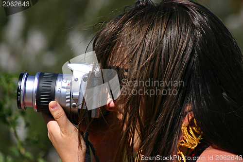 Image of Brunette photographer woman 