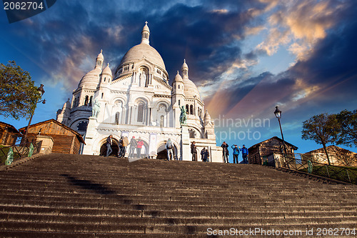 Image of Beautiful sunset colors over Sacred Heart Cathedral in Montmartr