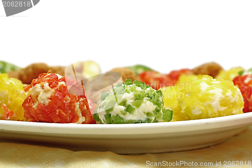 Image of ornate cheese on a white plate