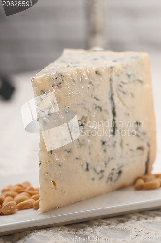 Image of gorgonzola cheese fresh cut and pinenuts