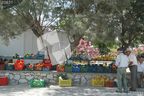 Image of farmers selling produce